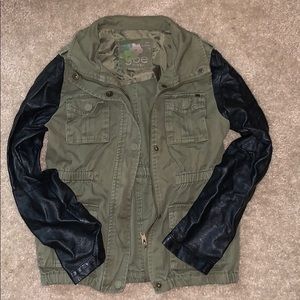 This is a jacket with leather sleeves.